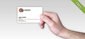 Business card in a man's hand